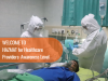 Two healthcare workers in full PPE, working on a patient lying in a hospital room bed, with course title overlaid